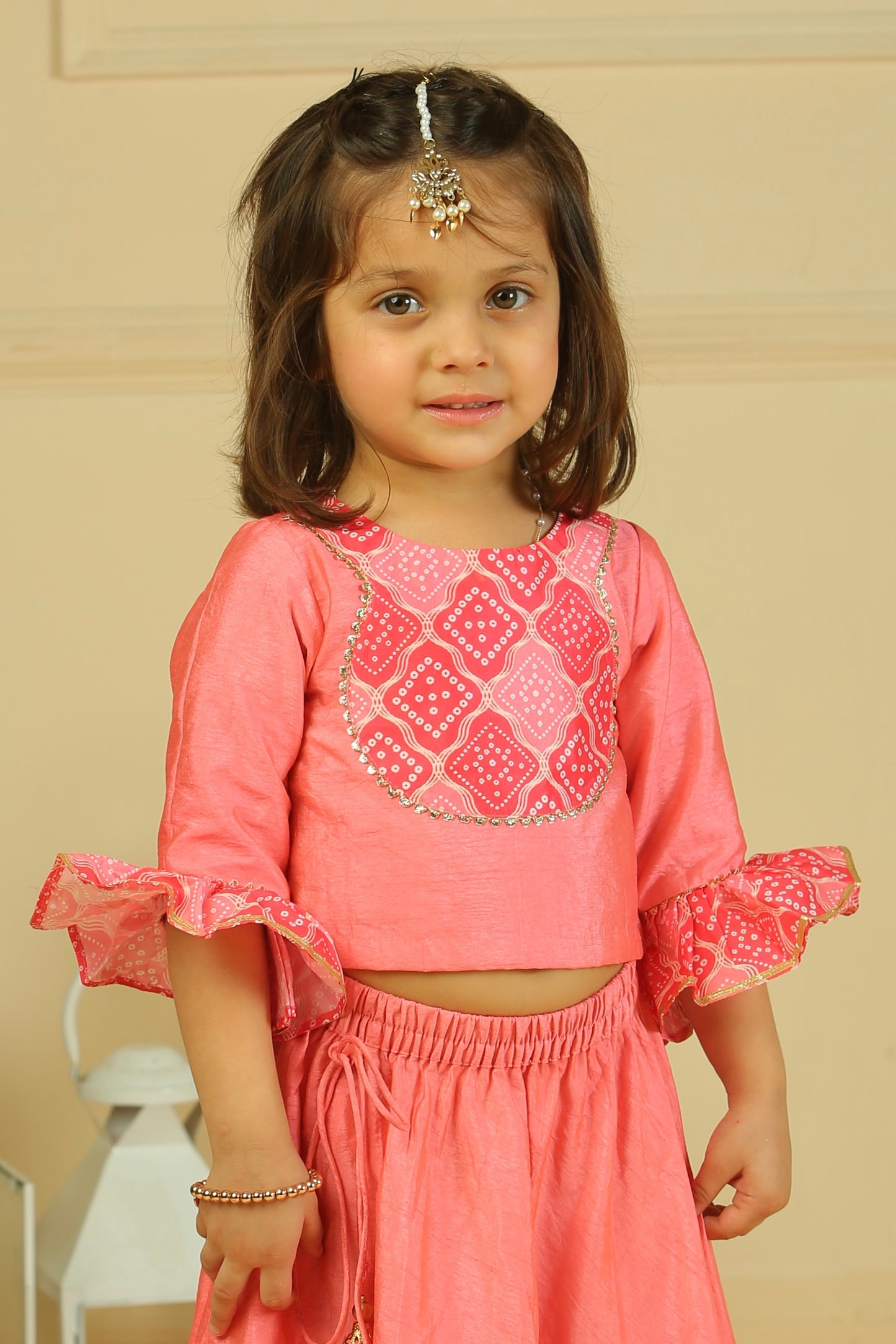 Pink 3/4th sleeves Choli paired with full flared lehenga