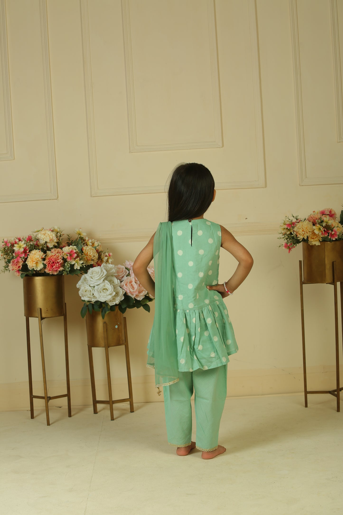 sage green gathered peplum paired with dhoti and dupatta