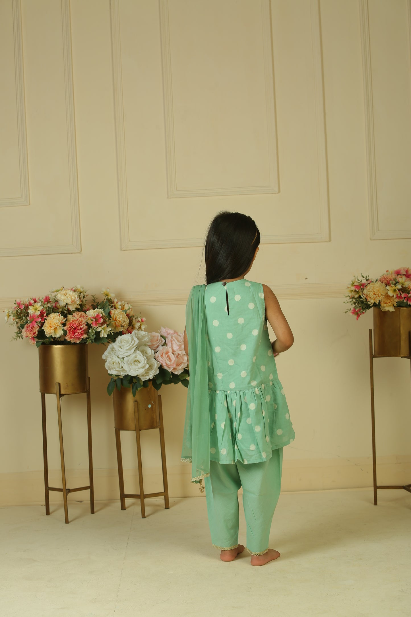 sage green gathered peplum paired with dhoti and dupatta