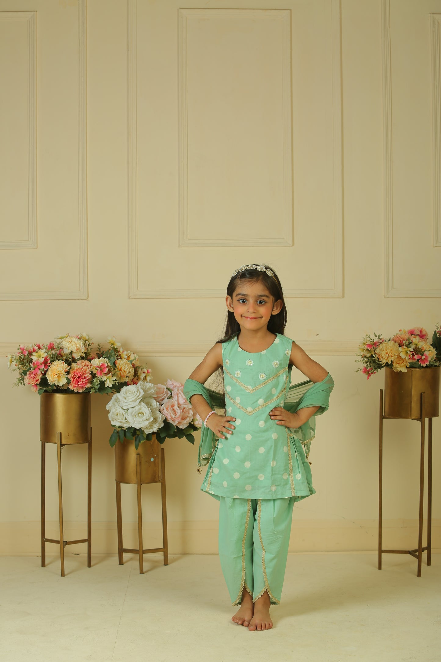 sage green gathered peplum paired with dhoti and dupatta