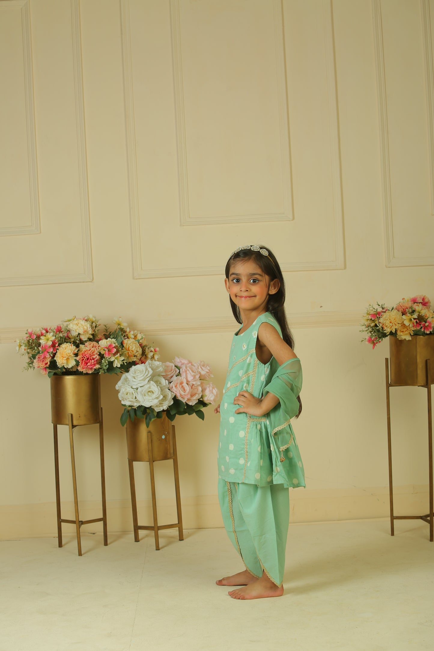 sage green gathered peplum paired with dhoti and dupatta
